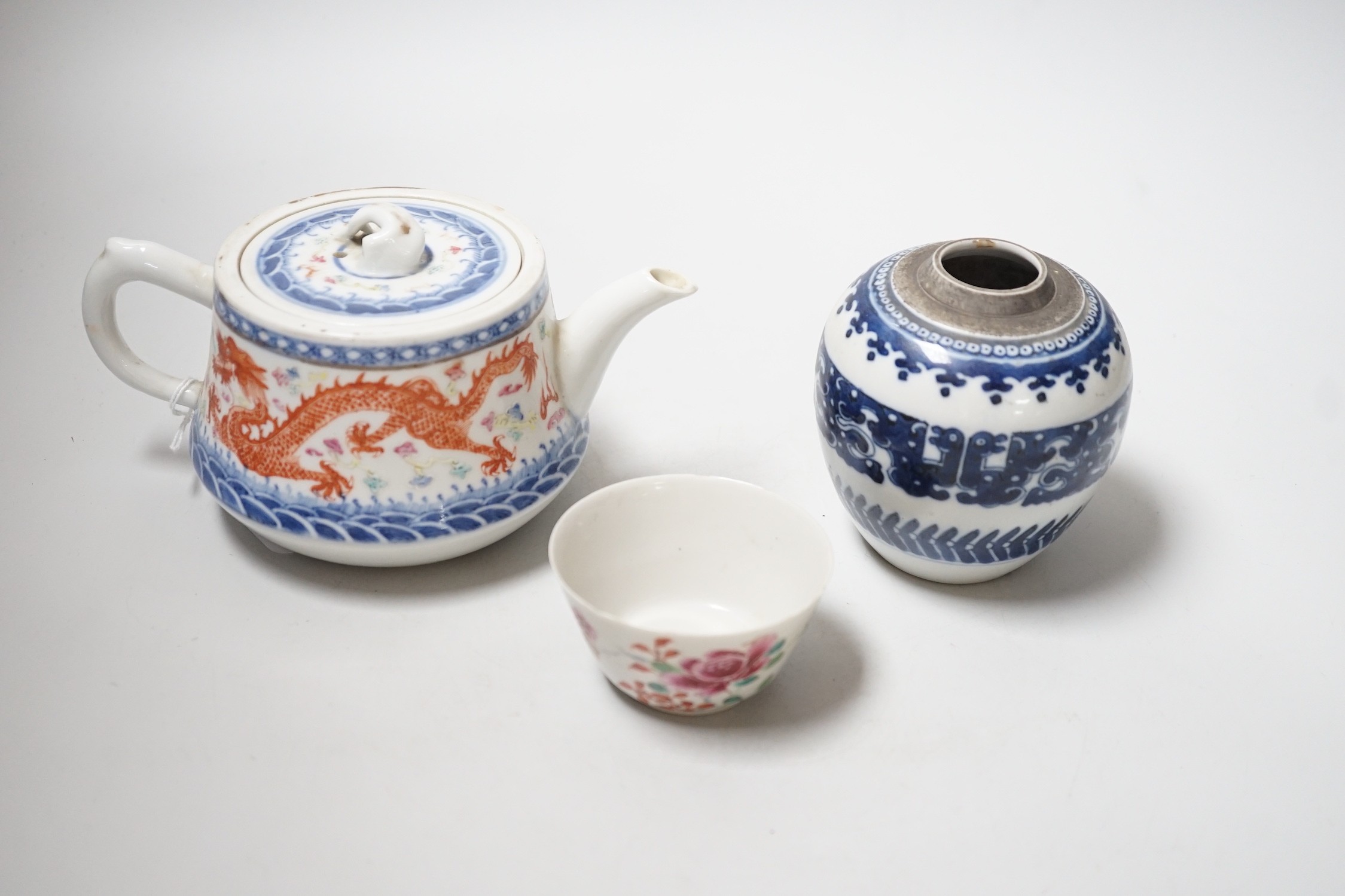 A Chinese blue and white ovoid vase, 9cm, a dragon teapot and cover and a famille rose cup